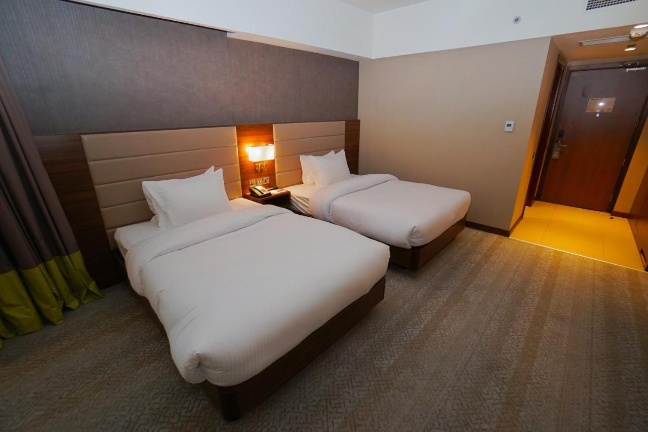 The Grand Lux Hotel Ad Dawhah Esterno foto Deluxe room