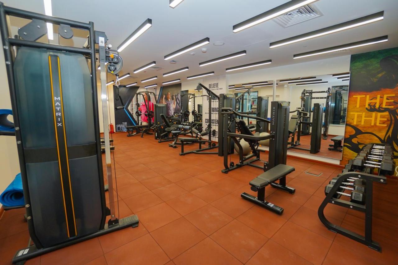 The Grand Lux Hotel Ad Dawhah Esterno foto The gym at the hotel