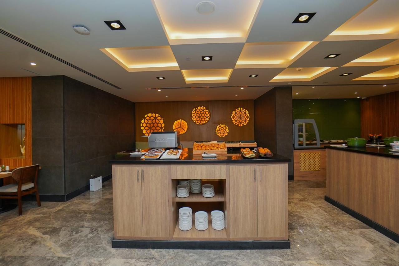 The Grand Lux Hotel Ad Dawhah Esterno foto The interior of the lounge